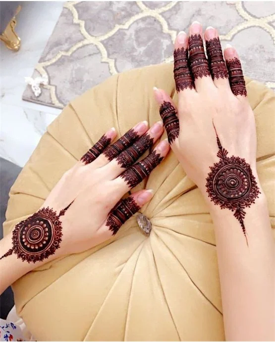 Butterfly Inspired Vibrant Back Finger Mehndi Design